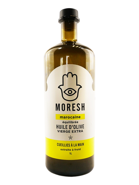 Une bouteille d'huile d'olive en verre foncée avec un motif Khamsa et des couleurs jaune